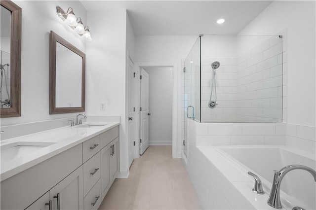 3167 Moor View Rd Unit 35, Duluth, GA 30096 - bathroom featuring a sink, double vanity, a shower stall, and a bath