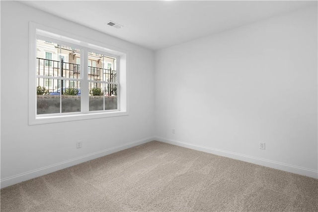 3167 Moor View Rd Unit 35, Duluth, GA 30096 - carpeted spare room with baseboards and visible vents