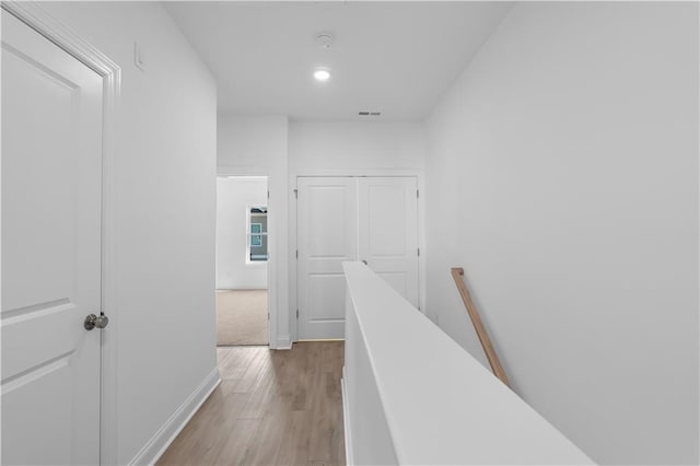3167 Moor View Rd Unit 35, Duluth, GA 30096 - hall with recessed lighting, baseboards, an upstairs landing, light wood-type flooring, and visible vents