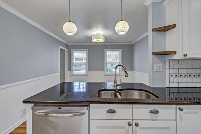 kitchen featuring open shelves, wainscoting, white cabinets, a sink, and dishwasher