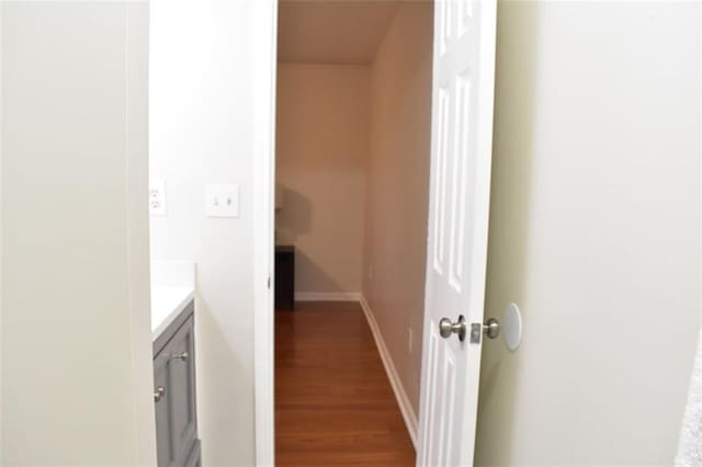 1676 Northridge Dr, Morrow, GA 30260 - bathroom with vanity, baseboards, and wood finished floors