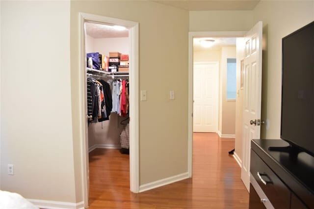 1676 Northridge Dr, Morrow, GA 30260 - corridor with baseboards and wood finished floors