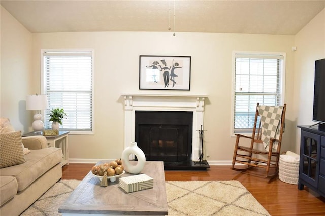 1676 Northridge Dr, Morrow, GA 30260 - living area with baseboards, plenty of natural light, and wood finished floors