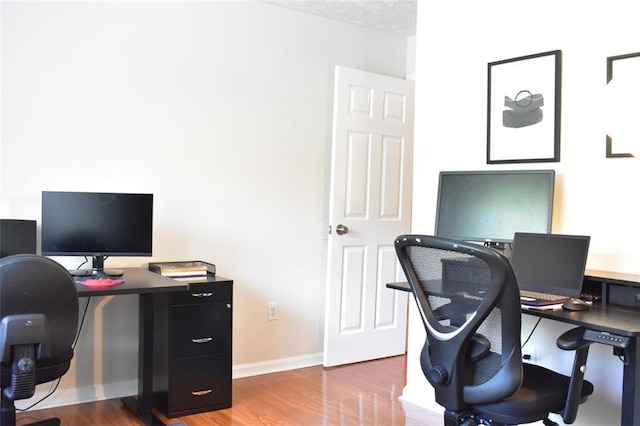 1676 Northridge Dr, Morrow, GA 30260 - office area with baseboards and wood finished floors