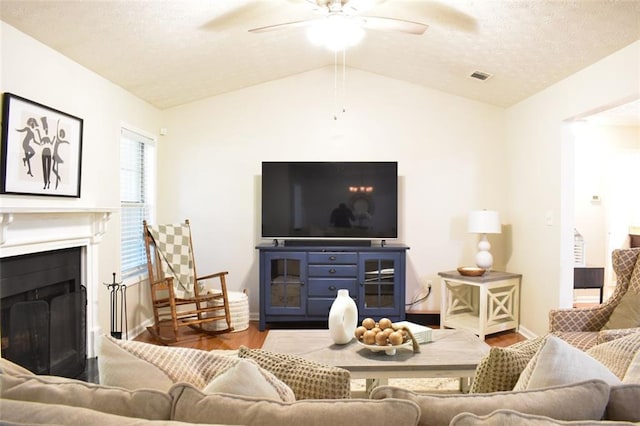 1676 Northridge Dr, Morrow, GA 30260 - living area featuring vaulted ceiling, a ceiling fan, wood finished floors, and visible vents