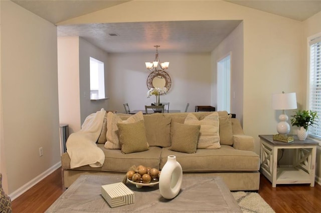 1676 Northridge Dr, Morrow, GA 30260 - living area with an inviting chandelier, baseboards, wood finished floors, and a wealth of natural light