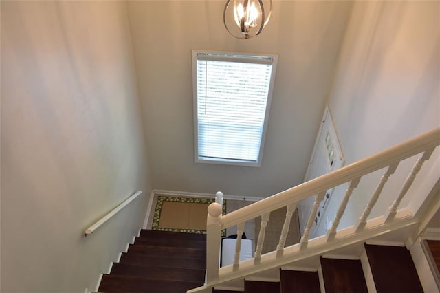 1676 Northridge Dr, Morrow, GA 30260 - staircase featuring a notable chandelier