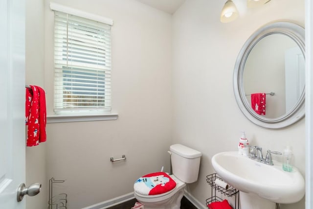 bathroom with sink and toilet