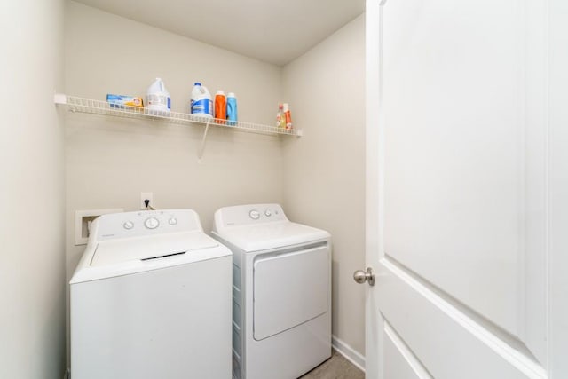 laundry room with washer and clothes dryer