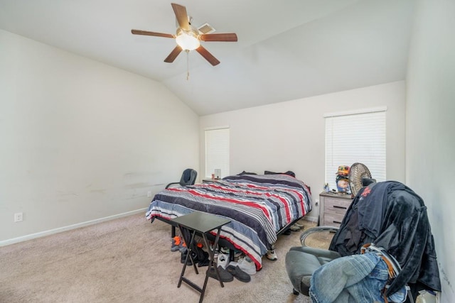 bedroom featuring ceiling fan, light colored carpet, and lofted ceiling