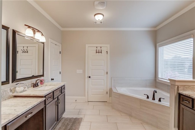 bathroom featuring vanity, tiled tub, and crown molding