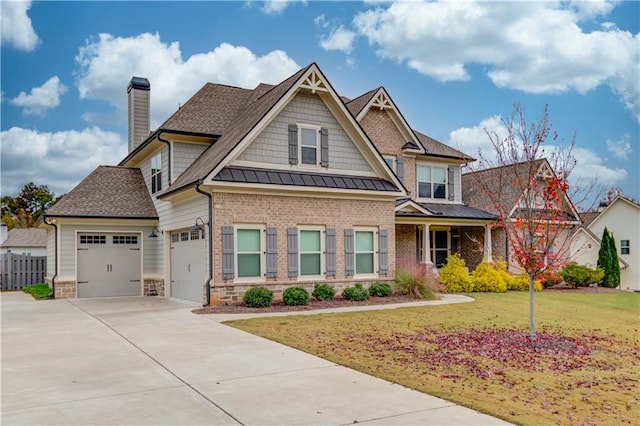 craftsman-style home featuring a front lawn