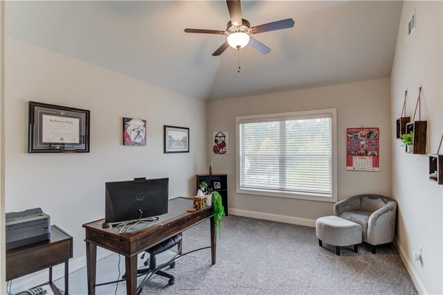 home office featuring carpet, lofted ceiling, and ceiling fan