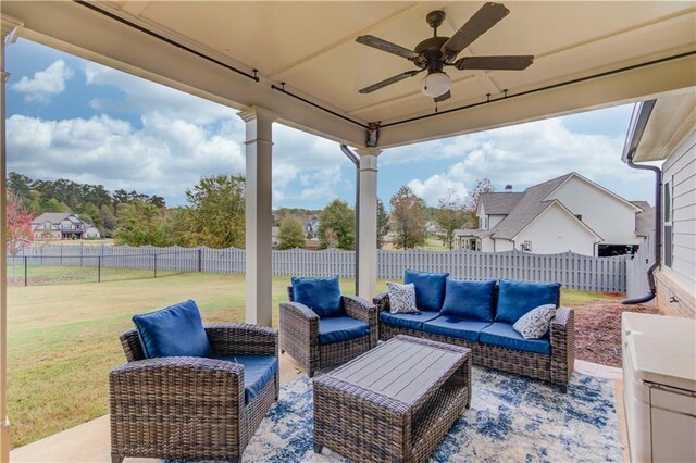 view of patio featuring outdoor lounge area and ceiling fan