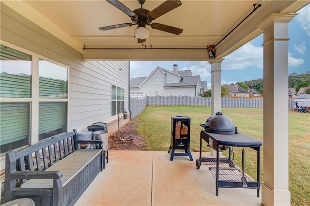 view of patio featuring ceiling fan