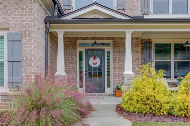 property entrance with a porch