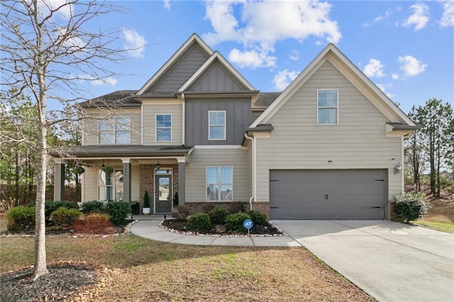 craftsman-style home with board and batten siding, brick siding, a garage, driveway, and covered porch