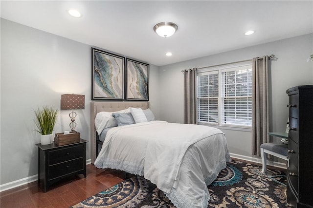 bedroom featuring recessed lighting, baseboards, and wood finished floors