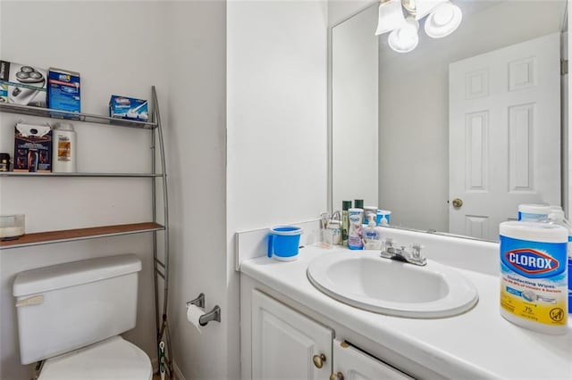 half bath with toilet and vanity