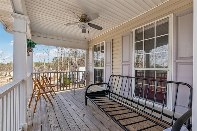 wooden deck with ceiling fan