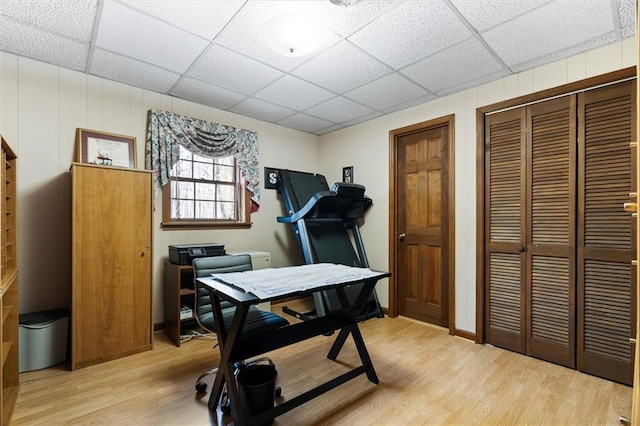 office with light wood-type flooring