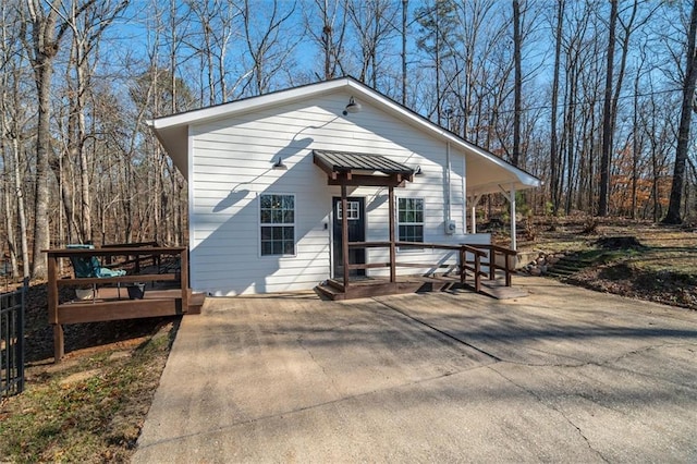 view of front of property with a wooden deck