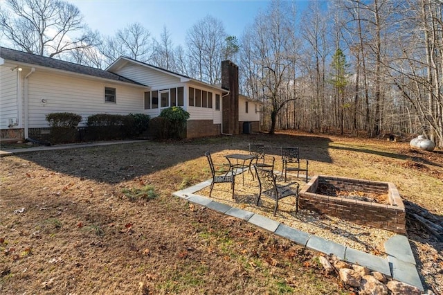 view of yard featuring a sunroom