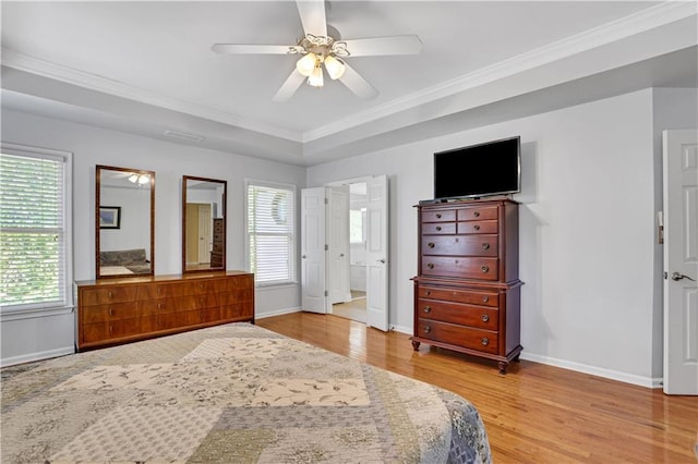 bedroom featuring ceiling fan, ornamental molding, and light wood-type flooring