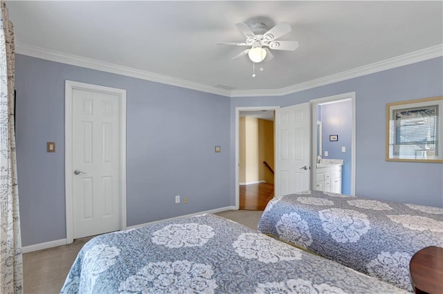 bedroom featuring ceiling fan, light colored carpet, ornamental molding, and ensuite bathroom