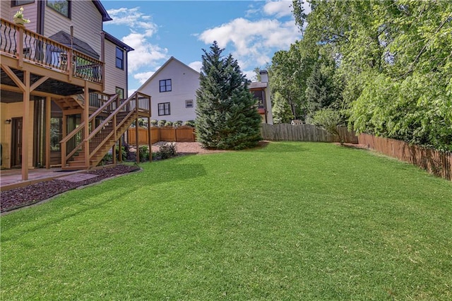 view of yard featuring a deck