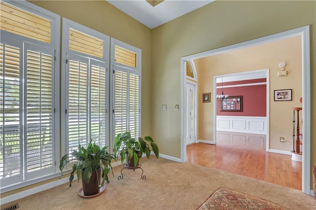 living area with light hardwood / wood-style floors