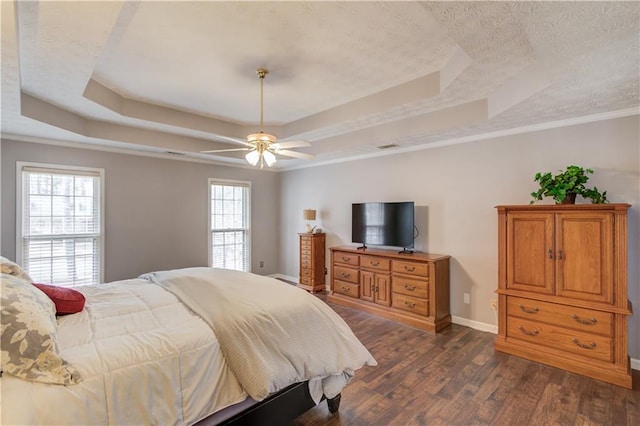 82 Cedar Blf, Winder, GA 30680 - bedroom featuring a raised ceiling, dark wood finished floors, multiple windows, and ornamental molding