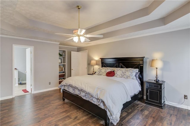 82 Cedar Blf, Winder, GA 30680 - bedroom featuring a tray ceiling, wood finished floors, crown molding, and a ceiling fan