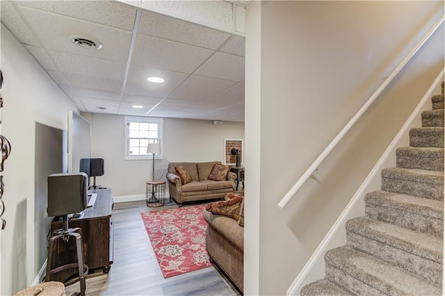 82 Cedar Blf, Winder, GA 30680 - living area with stairway, wood finished floors, recessed lighting, and a drop ceiling