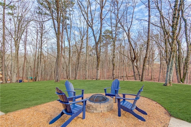 82 Cedar Blf, Winder, GA 30680 - view of grassy yard with an outdoor fire pit