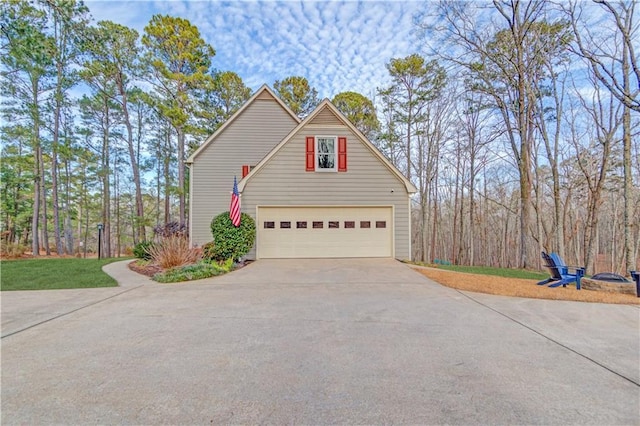 82 Cedar Blf, Winder, GA 30680 - view of side of property featuring driveway and a garage