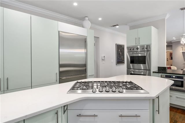 kitchen with visible vents, light countertops, ornamental molding, recessed lighting, and stainless steel appliances