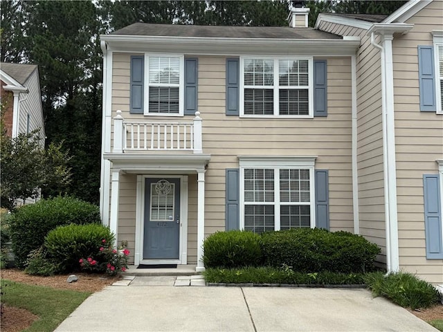 4172 Howell Park Rd, Duluth, GA 30096 - view of front facade featuring a chimney
