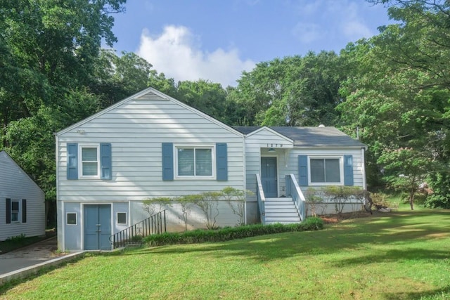 1279 Skyhaven Rd SE, Atlanta, GA 30316 - view of front of house with a front yard and view of scattered trees