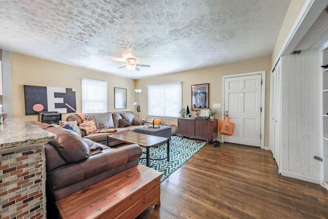 1279 Skyhaven Rd SE, Atlanta, GA 30316 - living room with a textured ceiling, a ceiling fan, and wood finished floors