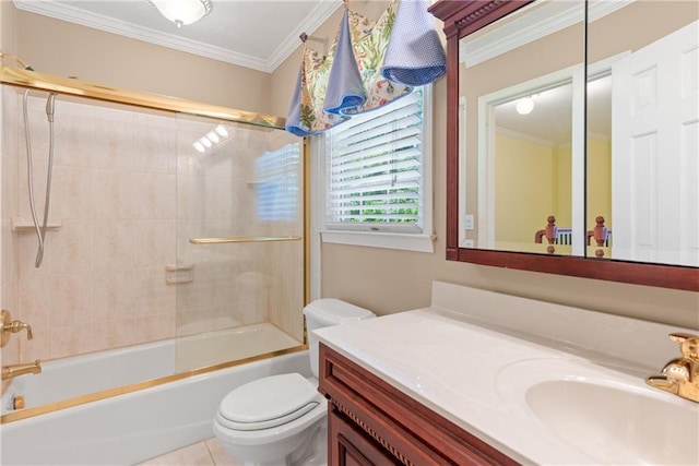 full bathroom featuring tile patterned flooring, bath / shower combo with glass door, vanity, ornamental molding, and toilet