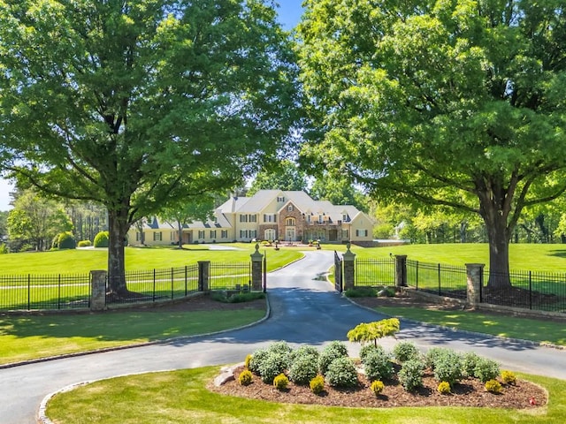 view of community featuring a yard