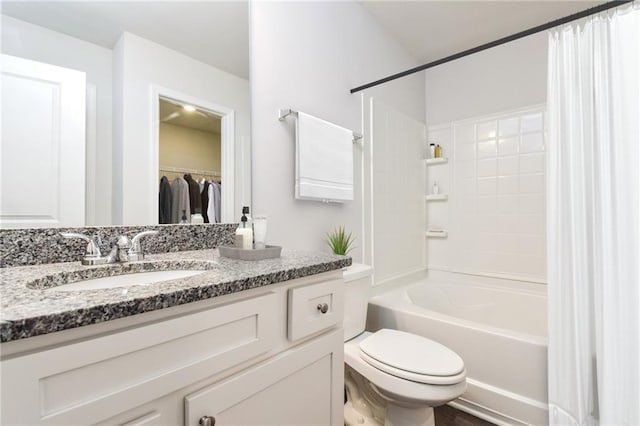 full bathroom with vanity, toilet, and shower / bathtub combination