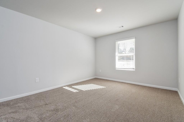 view of carpeted spare room