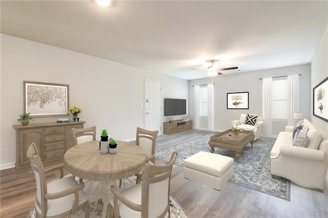 living room with hardwood / wood-style floors and ceiling fan