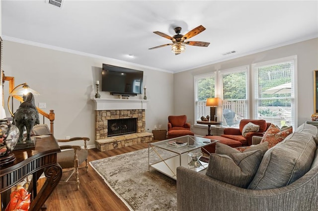 7537 Brookstone Cir, Flowery Branch, GA 30542 - living room featuring a ceiling fan, dark wood finished floors, crown molding, and a fireplace