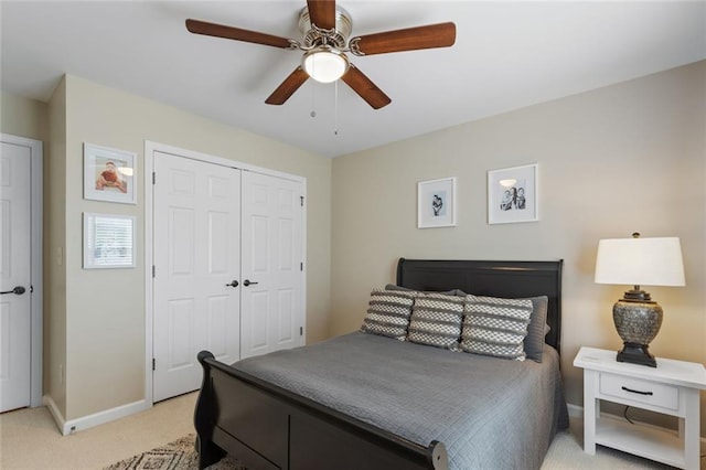 7537 Brookstone Cir, Flowery Branch, GA 30542 - bedroom with light carpet, a closet, and ceiling fan