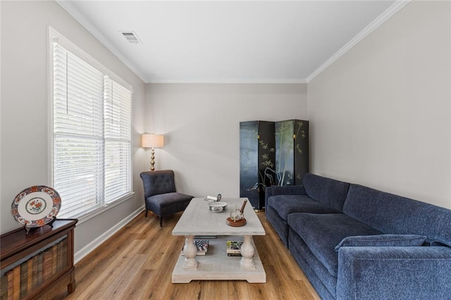 7537 Brookstone Cir, Flowery Branch, GA 30542 - living room featuring crown molding, wood finished floors, and plenty of natural light