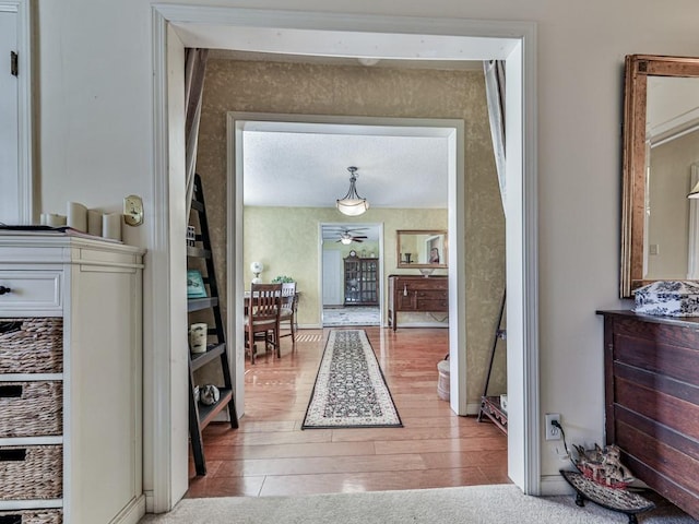 corridor featuring light wood-type flooring