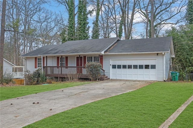 ranch-style home with a garage and a front lawn